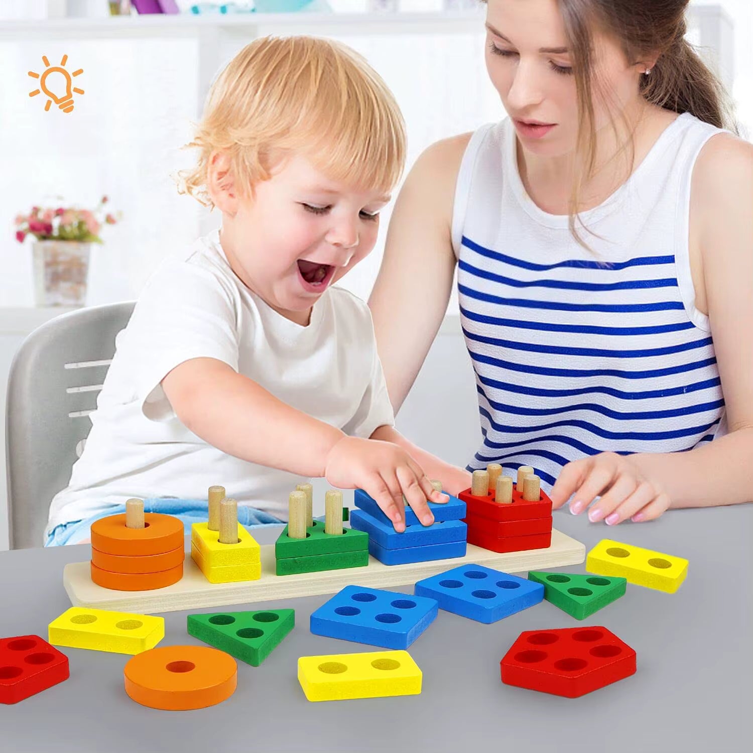 Parent et enfant jouant avec un jeu éducatif
