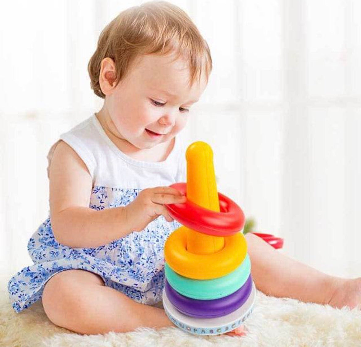 Enfant qui apprend avec un jeu éducatif PETIGENIE